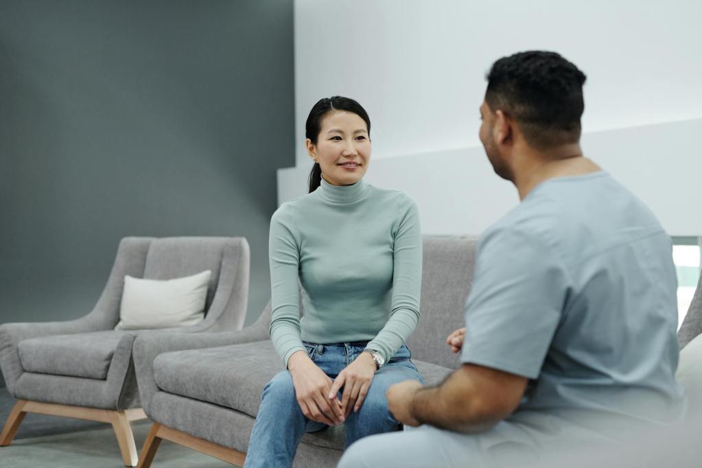a happy woman getting a check up